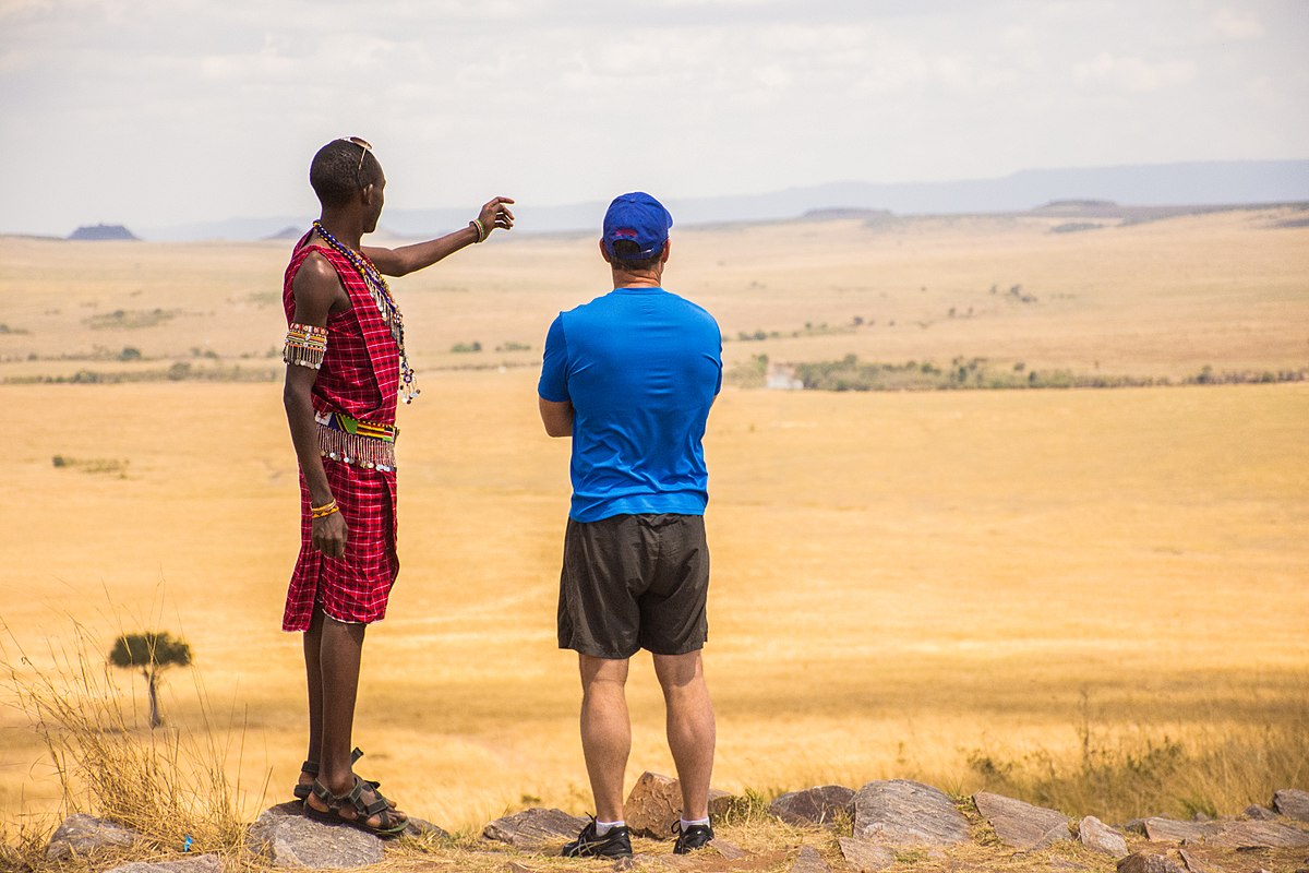 1200px-Masai_guide_sharing_his_vast_knowledge (1)